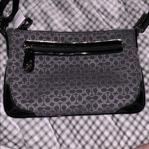 Coach charcoal shoulder bag.
